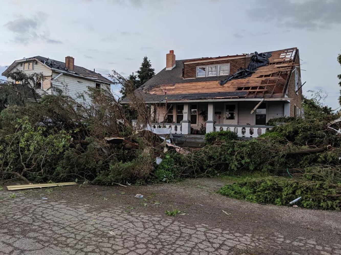 Photos: Community rallies around Dayton restaurant owner after son’s death, tornado