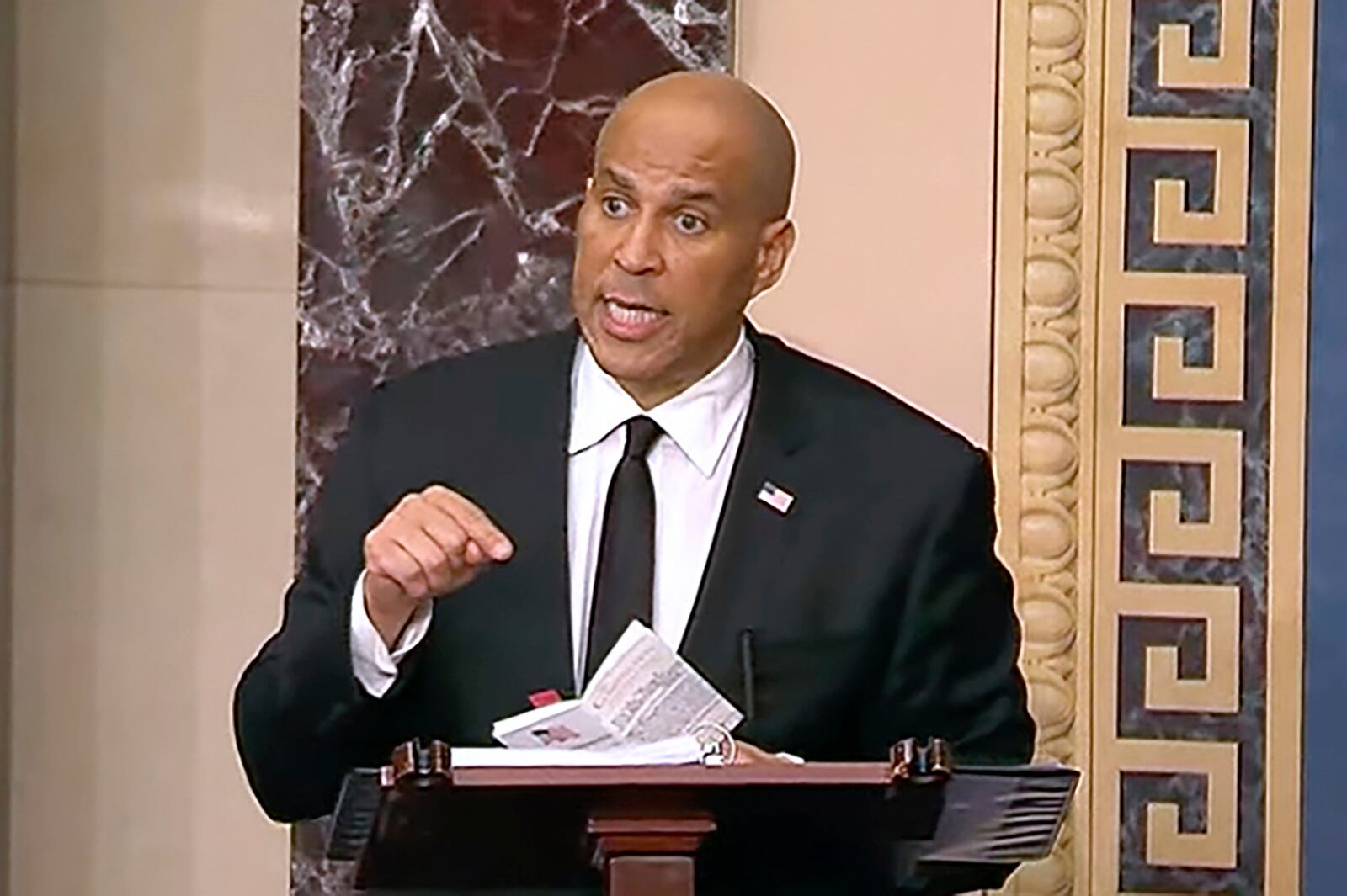 In this image provided by Senate Television, Sen, Cory Booker, D-N.J. speaks on the Senate floor, Tuesday morning, April 1, 2025. (Senate Television via AP)
