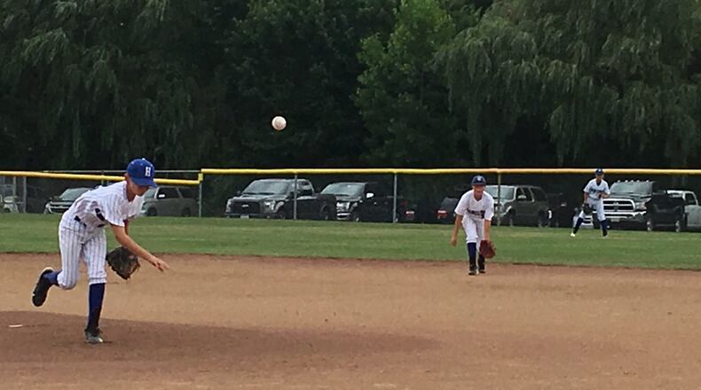 Hamilton West Side pitcher Eddie Tanner deals to the plate Saturday afternoon during a 10-3 loss to Galion in the Ohio Little League Tournament at the Hoover Community Recreation Complex in North Canton. RICK CASSANO/STAFF