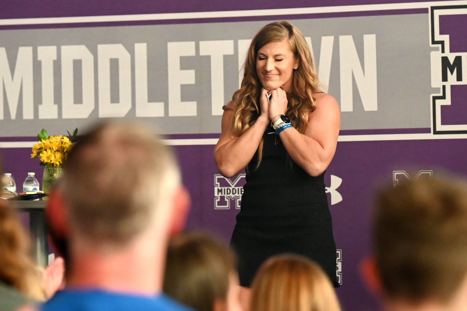 Middletown native and recently crowned UFC Women's Bantamweight Champion Kayla Harrison returned to her hometown on Thursday, July 10, 2025. She spoke to an estimated 2,000 that attended Wade E. Miller gym at Middletown High School where she donated $5,000 to Hope House Mission and received a key to the city. MICHAEL D. PITMAN/STAFF