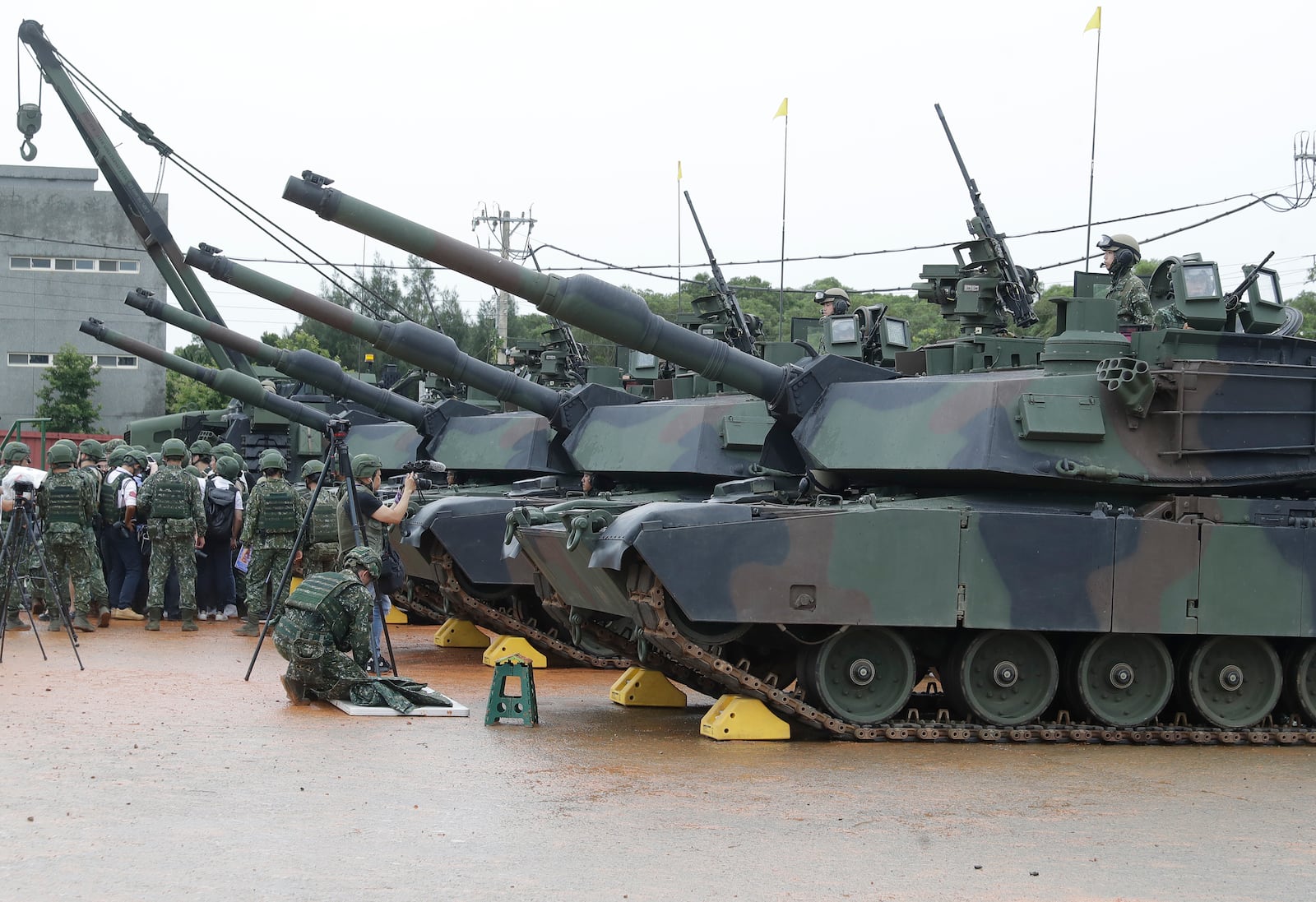 M1A2T Abrams main battle tanks are prepared for a military live-fire shooting training in Hsinchu County, Taiwan, Thursday, July 10, 2025. (AP Photo/Chiang Ying-ying)