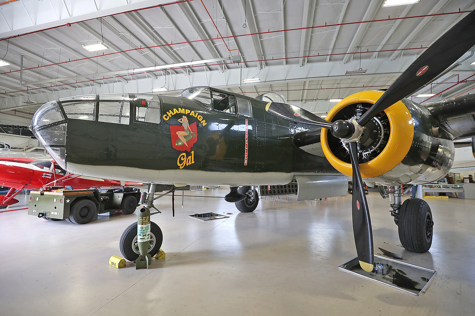 The "Champaign Gal," a B-25 bomber that's normally on display at the Champaign Aviation Museum in Urbana, is shown in a file photo. The aircraft is stranded at an Indiana airport after engine issues. BILL LACKEY/STAFF