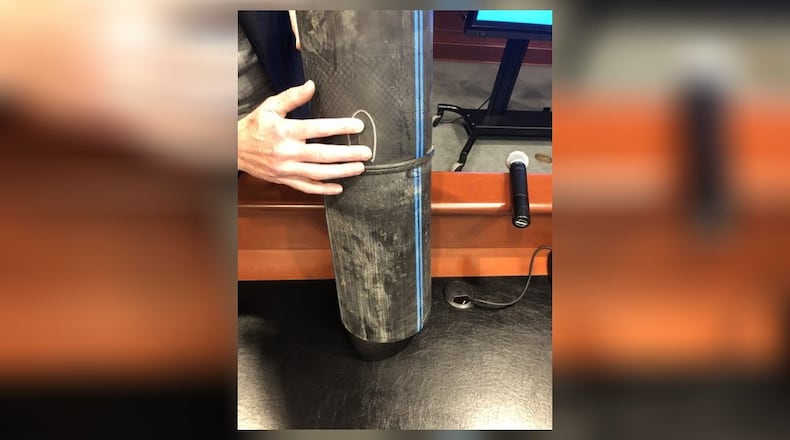 Here is a section of high-density polyethylene pipe that failed. Hamilton officials are disappointed that this kind of pipe, once considered the material of the future for water mains, has been failing well before their expected timeframes, as has happened in other cities. MIKE RUTLEDGE/STAFF