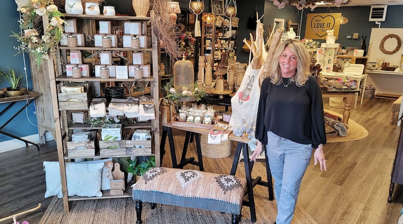 Erin Robinson in her We Love it Too kitchen and decor shop. NICK GRAHAM/STAFF