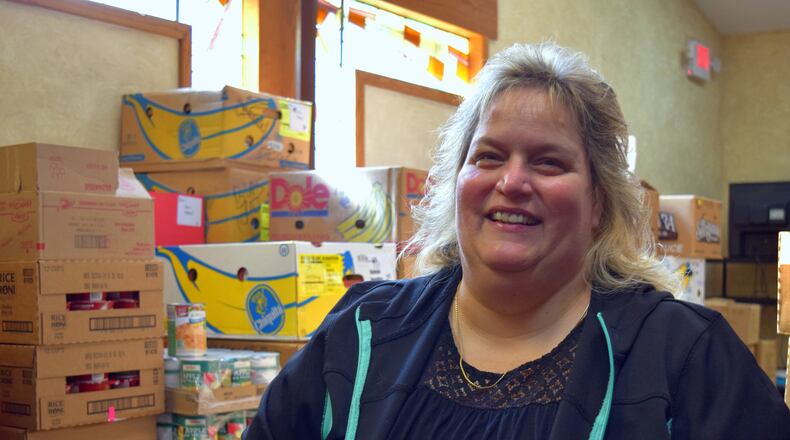 Traci had a tough time making ends meet while working at a fast food restaurant, so she turned to the network of Shared Harvest food pantries when food was scarce at home. CONTRIBUTED/RICHARD O JONES