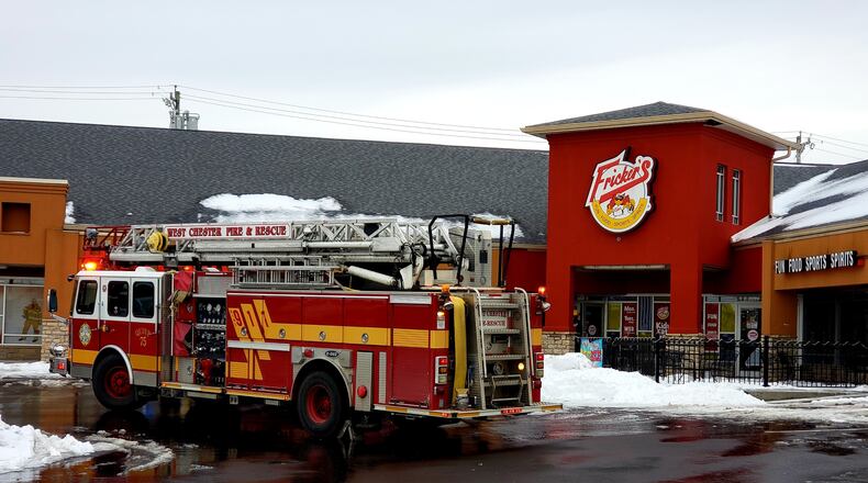 West Chester Fire Department responds to Fricker’s restaurant at 7844 Kingland Drive in West Chester Twp. for a report of a partial ceiling collapse Tuesday, Jan. 22, 2019. NICK GRAHAM/STAFF