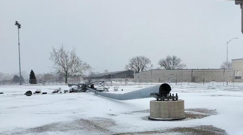 A light pole lays on the ground near Wright-Patterson Air Force Base’s flightline after it was blown over by high winds during a winter storm Dec. 23, 2022. The storm caused nearly $4 million in damage across both areas of the installation. (Contributed photo)