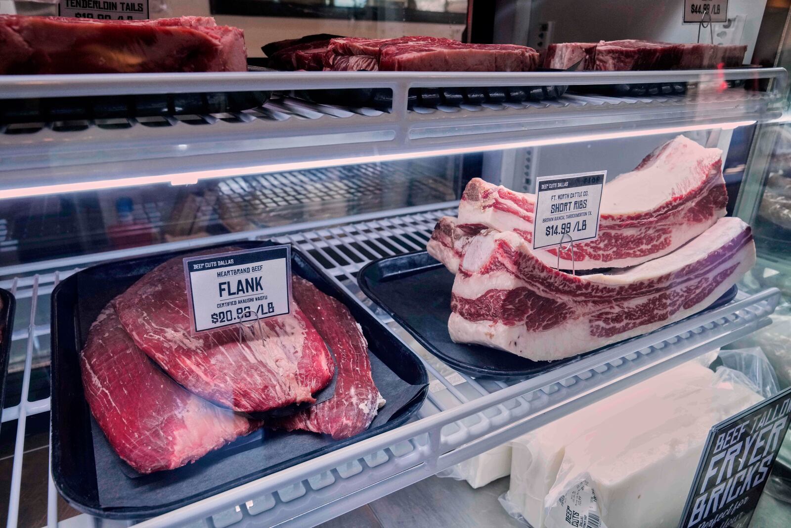 Different cuts of beef sit in the display case at Deep Cuts Dallas Butcher Shop, Thursday, July 24, 2025, in Dallas. (AP Photo/Tony Gutierrez)
