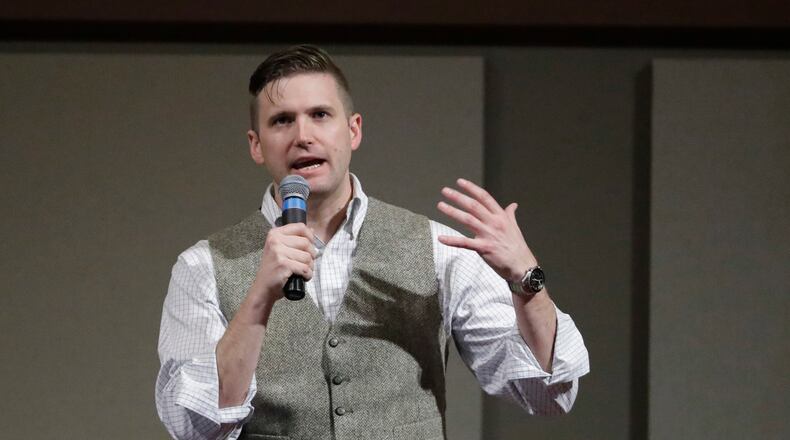 FILE - In this Dec. 6, 2016, file photo, Richard Spencer, who leads a movement that mixes racism, white nationalism and populism, speaks at the Texas A&M University campus in College Station, Texas. A lawsuit has been filed against Michigan State University after it denied a request to rent space on campus for Spencer to speak in September. Georgia State University student Cameron Padgett, who tried to rent the room, sued Sunday, Sept. 3, 2017, alleging the university is violating Spencer’s free speech. (AP Photo/David J. Phillip, File)