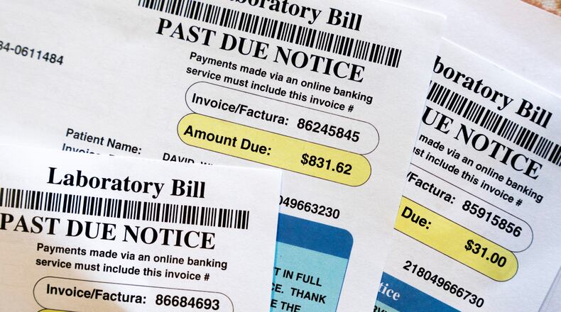 An Ohio committee is currently vetting House Bill 257, which would cap medical debt interest at 3% and forbid collection agencies from trying to garnish Ohioan’s wages for to repay medical debt, in addition to prohibiting health care providers and collection agencies from reporting medical debt to to consumer reporting agencies. (AP Photo/Jacquelyn Martin, File)