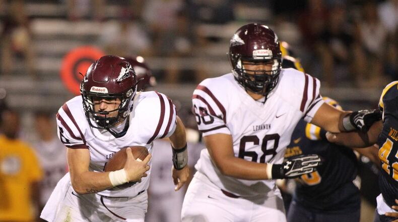 Lebanon quarterback Dakota Allen carries the ball at Springfield on Sept. 23. DAVID JABLONSKI/STAFF