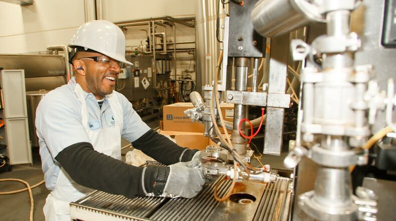 Ben Newsom, a Marine Corps veterans, works at Synergy Flavors in Hamilton. The company — a supplier of flavors, essences and extracts for the global food and beverage industry — says it is reaping the benefits of hiring military veterans for its Hamilton facility.