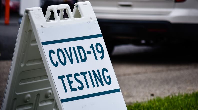 Cars line up for COVID-19 testing Tuesday, May 5, 2020 at Fort Hamilton Hospital in Hamilton. NICK GRAHAM / STAFF