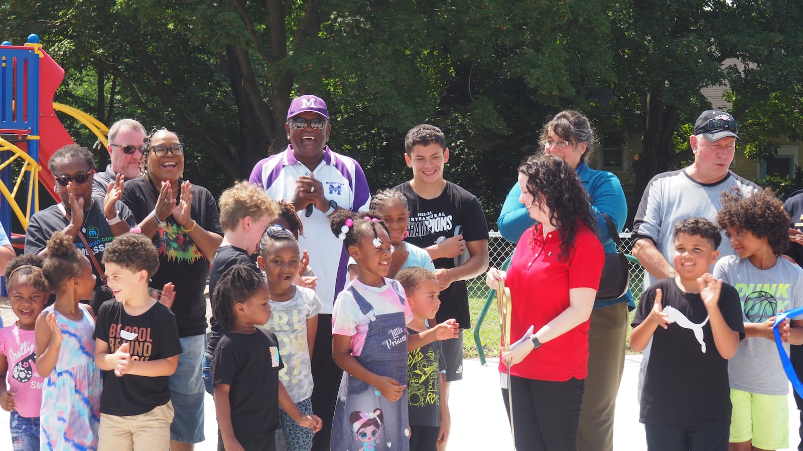 Ribbon cutting at Oakland Park's reopening community picnic. A pickleball court, shelter, new playground equipment and more were added. BRYN DIPPOLD/STAFF