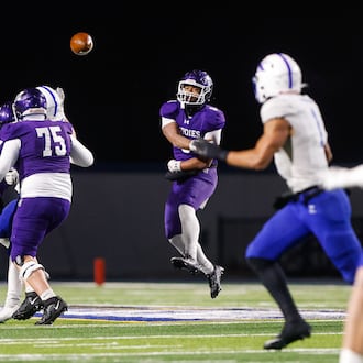 Middletown quarterback Joseph Ward passes the ball during their Division I State semifinal football game against St. Xavier Friday, Nov. 28, 2025 at Welcome Stadium in Dayton. The Bombers won 21-6. NICK GRAHAM/STAFF