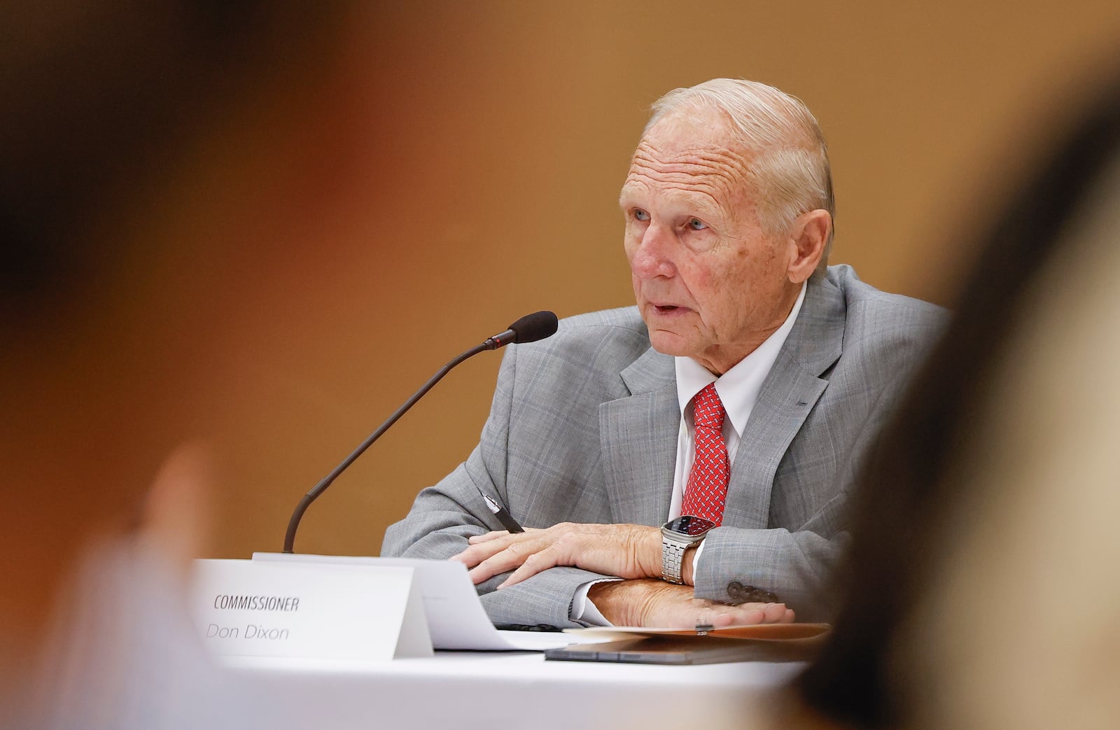 Butler County Commissioner Don Dixon speaks to the crowd of nearly fifty people during a discussion on homelessness with local elected officials and social service organizations in attendance Monday, July 29, 2024 in Hamilton. NICK GRAHAM/STAFF