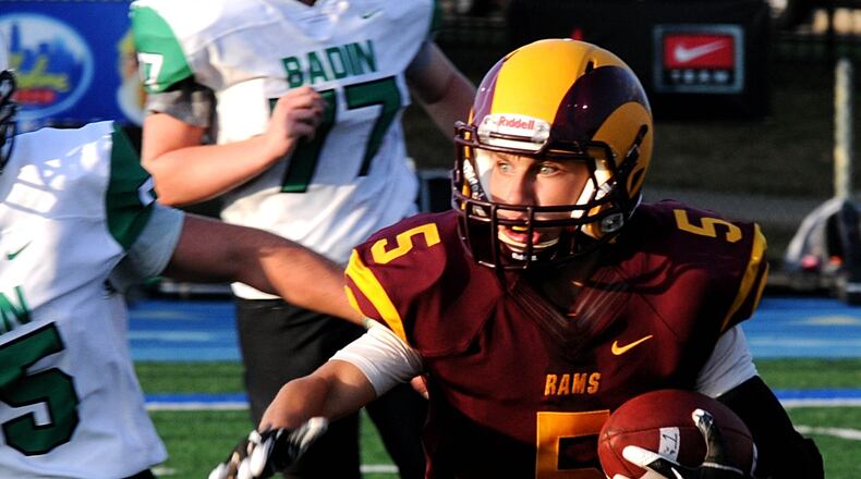 Shay Mather (5) of Ross looks for running room during the Rams’ season opener against Badin on Aug. 25 at Virgil Schwarm Stadium in Hamilton. Ross lost 36-6. CONTRIBUTED PHOHTO BY DAVID A. MOODIE
