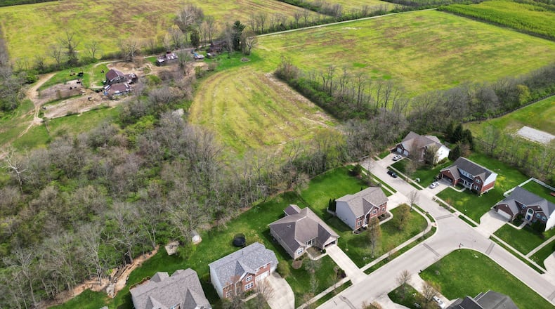 Clearcreek Heights is a proposed single-family housing development off Ohio 73 in Clearcreek Twp. that would be connected to Richard's Run, shown at bottom right, and North Hills of Stone Ridge in Springboro, shown at top. NICK GRAHAM/STAFF