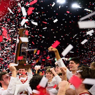 The Miami University men's basketball team hoists the Mid-American Conference trophy after beating Toledo 74-72 on Tuesday, March 3, 2026 at Millett Hall. JEREMY MILLER / CONTRIBUTED PHOTO