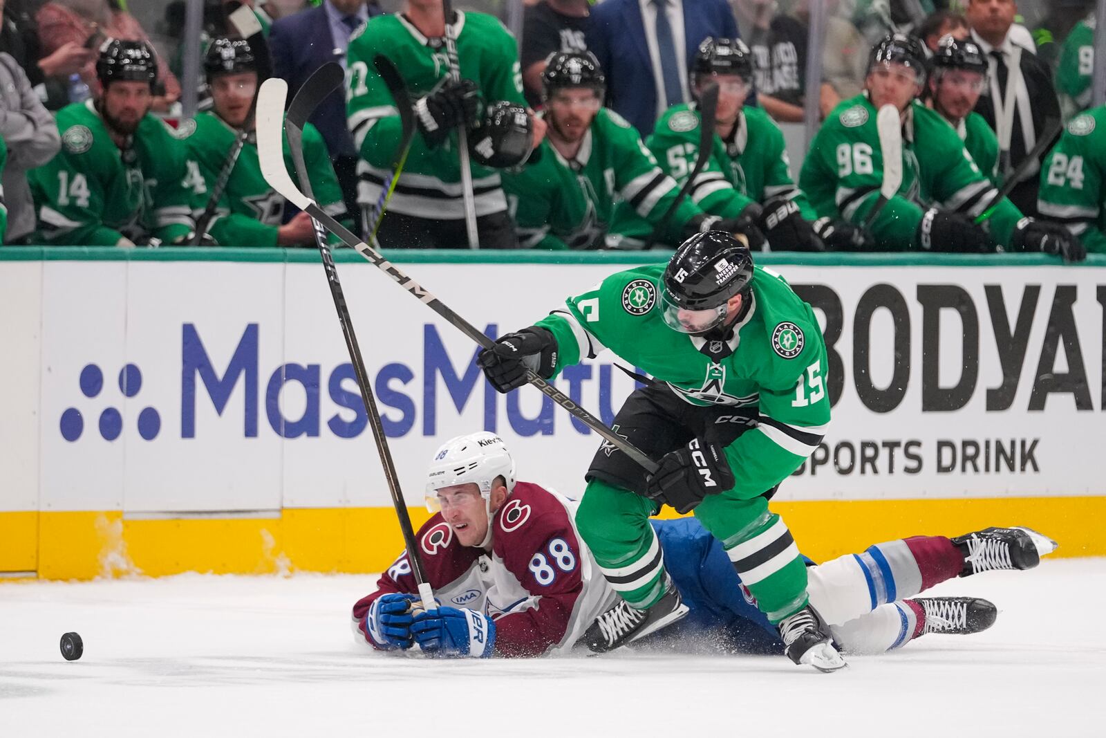Dallas Stars center Colin Blackwell (15) competes for possession against Colorado Avalanche center Martin Necas (88) during the first period in Game 2 of a first-round NHL hockey playoff series Monday, April 21, 2025, in Dallas. (AP Photo/Julio Cortez)