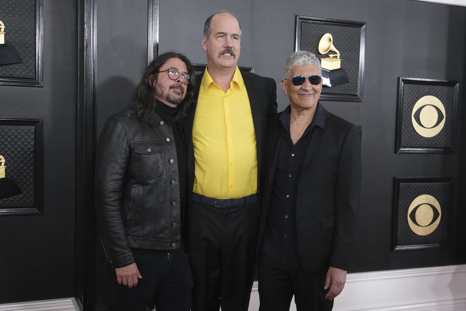 FILE - Dave Grohl, from left, Krist Novoselic, and Pat Smear of Nirvana appear at the 65th annual Grammy Awards on Feb. 5, 2023, in Los Angeles. (Photo by Jordan Strauss/Invision/AP, File)