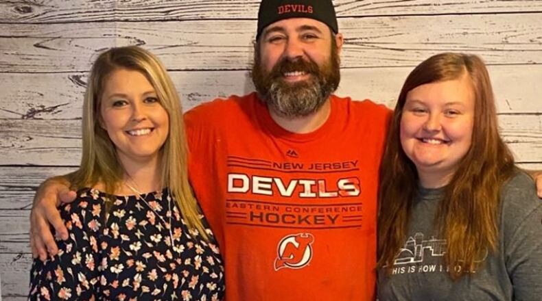 Sarah, Jim and Grace DesLaurier are making custom desks for students learning at home.