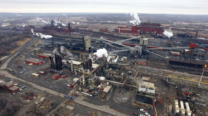 Aerial view of the AK Steel Middletown Works. The big steel producer covers more than 2,700 acres in the city to operate coke ovens, a blast furnace, hot strip mill and more than a dozen other steel production related processes. TY GREENLEES / STAFF