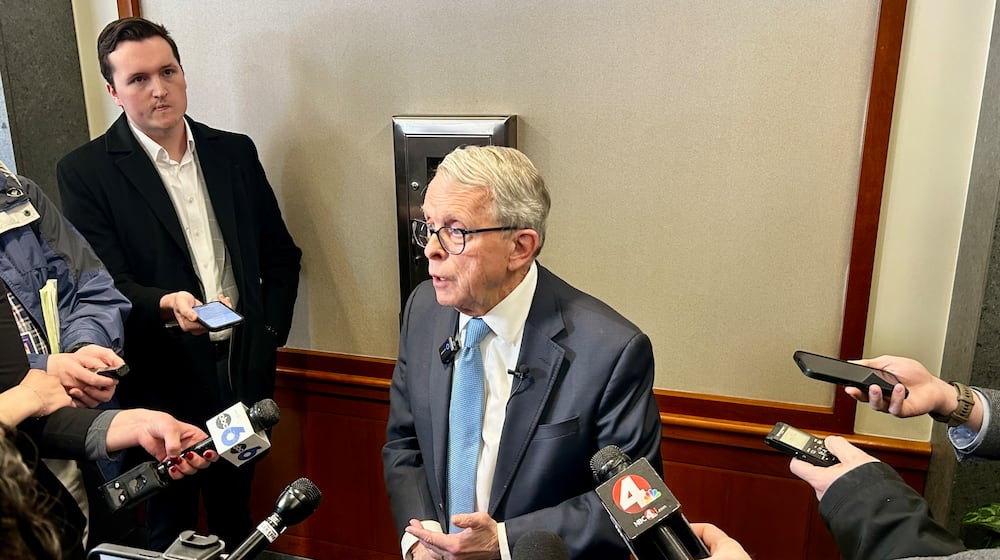 Ohio's Republican Gov. Mike DeWine briefs the press on Jan. 30, 2026, a few days before many of Springfield's Haitian immigrants are set to lose their legal protected status under federal law.