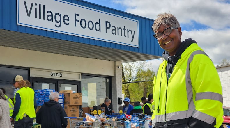 Pam Benson, founder and director of New Miami's Village Food Pantry, said the food pantry is seeing a shift with some clients coming in more frequently, which began around the time of the federal government shutdown. STAFF