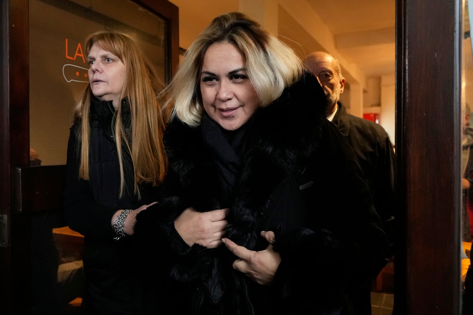 Veronica Ojeda, former partner of the late soccer star Diego Maradona, leaves a cafe during a break in the trial of health professionals accused of negligence in his death, in San Isidro, on the outskirts of Buenos Aires, Argentina, Tuesday, May 27, 2025. (AP Photo/Gustavo Garello)