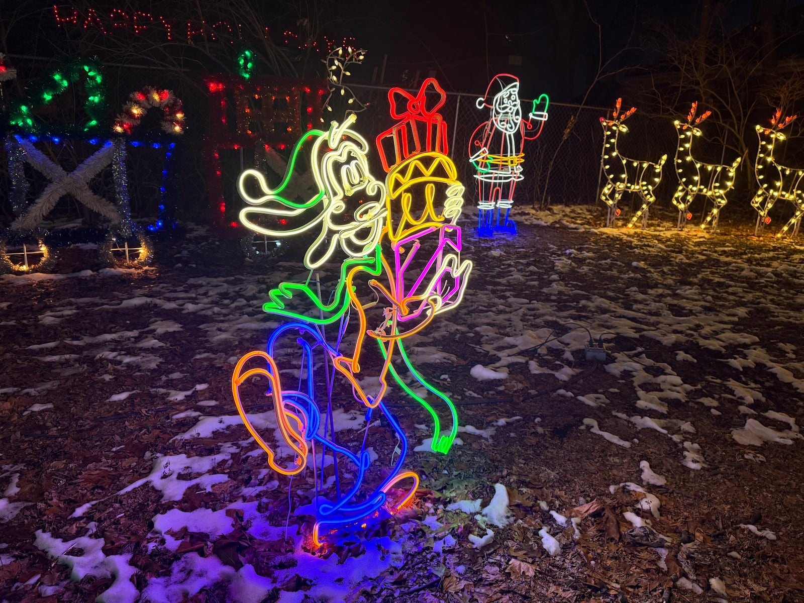 Each holiday season, Richard Smith teams up with his son Alex to put up a massive lights display in front of his home in Piqua. Photos by Alex Cutler