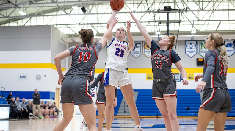 Carroll beat Goshen and Bellbrook beat Monroe to win Division III district titles on Saturday, Feb. 28, 2026 at Springfield High School. MICHAEL COOPER / STAFF