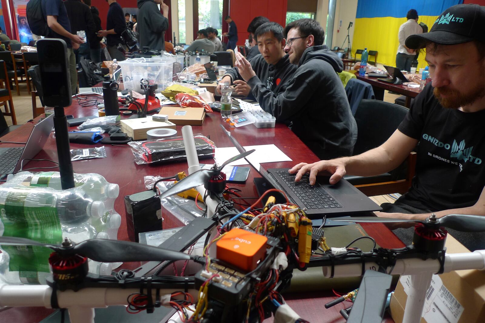Participants gather for the London Defence Tech Hackathon, a weekend brainstorming solution for technical challenges, at the Royal Military Academy Sandhurst in Camberley, England, May 10, 2025. (AP Photos/Kelvin Chan)