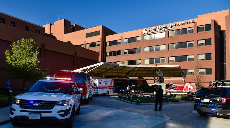 Some young people are among the new patients with the novel coronavirus. Pictured are police and fire department vehicles lining up in front of Kettering Health Network’s Fort Hamilton Hospital last month to thank healthcare workers during the pandemic. NICK GRAHAM/FILE