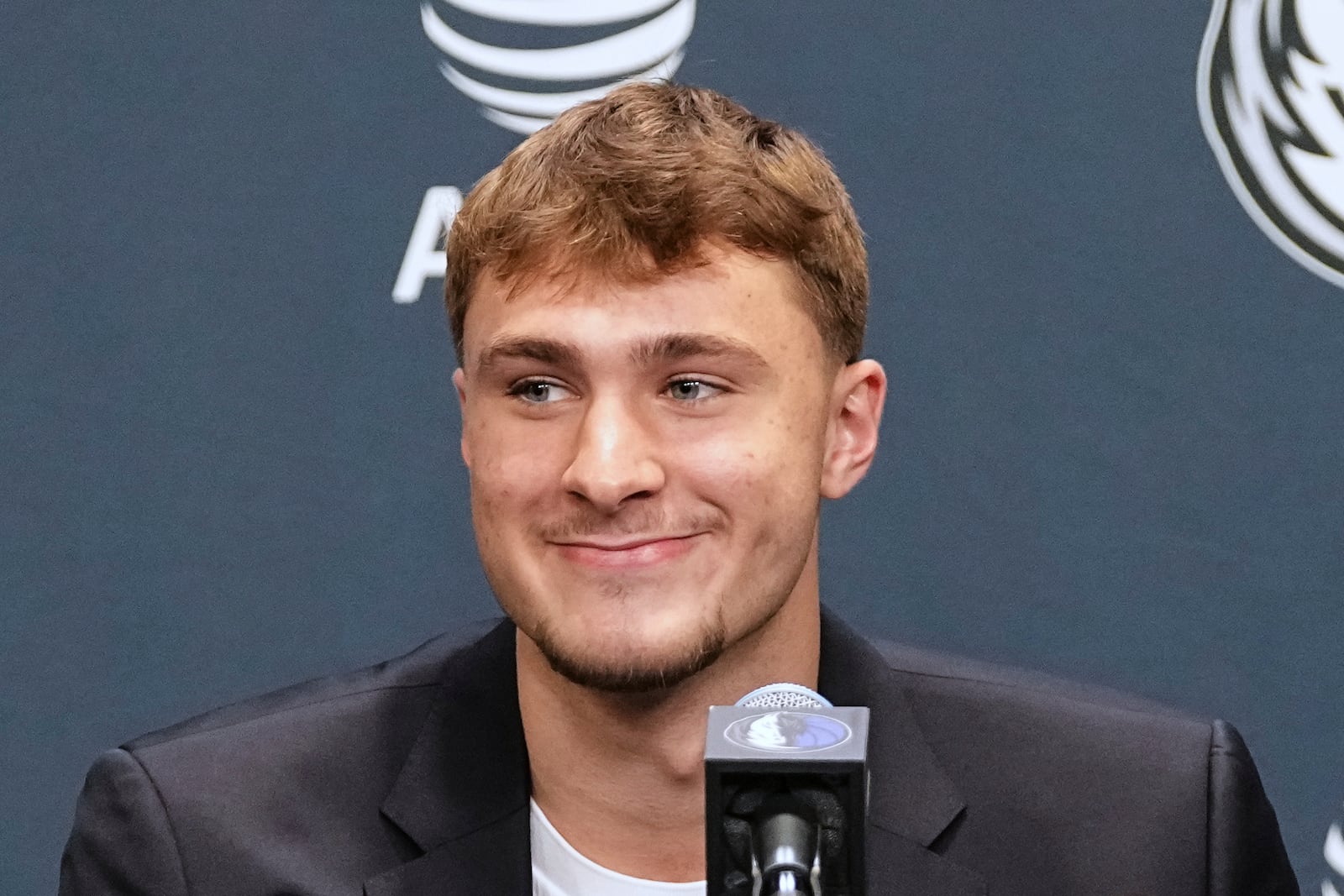 Dallas Mavericks' Cooper Flagg, the No. 1 overall pick in the NBA draft, takes questions during an NBA basketball press conference at the team's practice facility, Friday, June 27, 2025, in Dallas. (AP Photo/Tony Gutierrez)