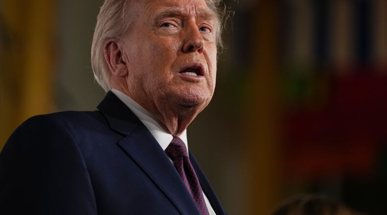 President Donald Trump arrives for the premiere of first lady Melania Trump's movie "Melania" at The John F. Kennedy Memorial Center For The Performing Arts, Thursday, Jan. 29, 2026, in Washington. (AP Photo/Allison Robbert)