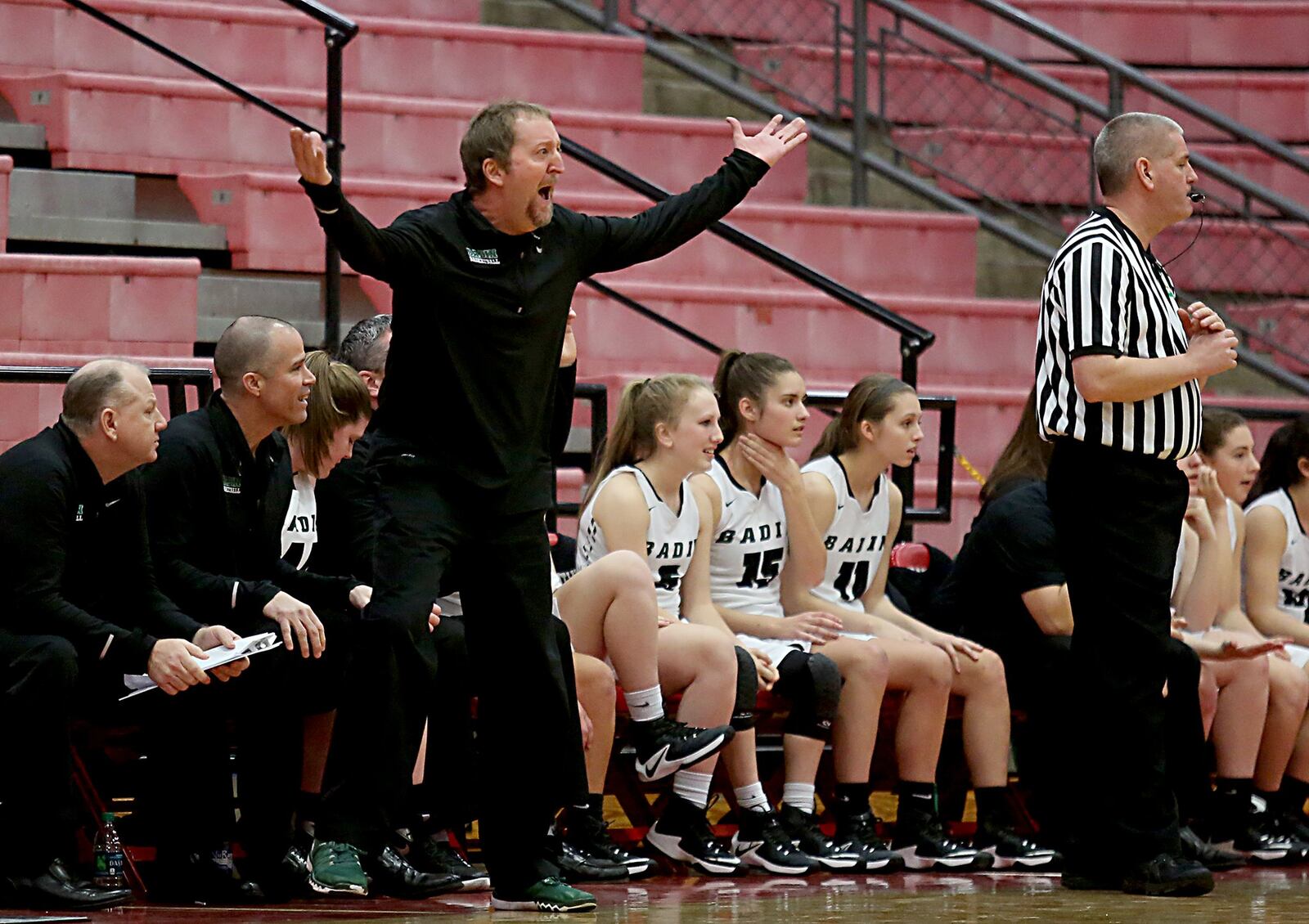 Badin coach Tom Sunderman shows his displeasure with a call during their Division III sectional final against Madeira at Fairfield Arena on Saturday afternoon. CONTRIBUTED PHOTO BY E.L. HUBBARD