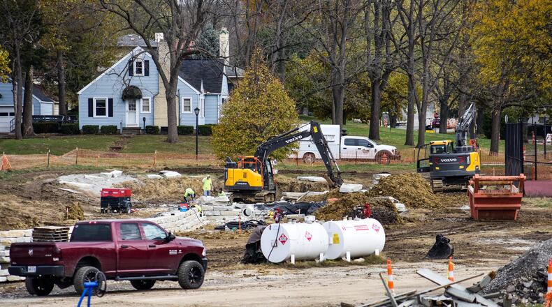 Construction work continues at Sunset Park Wednesday, Nov. 6 on the first phase of Middletown’s $269 million project to repair sewer overflow issues. The $2.71 million project is the first of several in the 25-year Long Term Control Plan established by the consent decree with the U. S. Environmental Protection Agency to correct sewer overflows into the Great Miami River. The project includes constructing a storm sewer to intercept a portion of the flow from the Bulls Run stream where it enters the combined sewer system near the intersection of Sheldon Road and Santa Fe Drive. City officials said the intercepted flow from the drainage area will be redirected to an approximately one-acre regional green infrastructure retention basin located at Sunset Park, reducing storm water loading to the combined sewer system. The new features are designed to not detract from the park’s character. NICK GRAHAM/STAFF