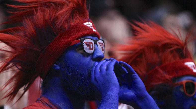 A fan cheers during a game between Dayton and Tennessee Tech on Dec. 6, 2017, at UD Arena. David Jablonski/Staff