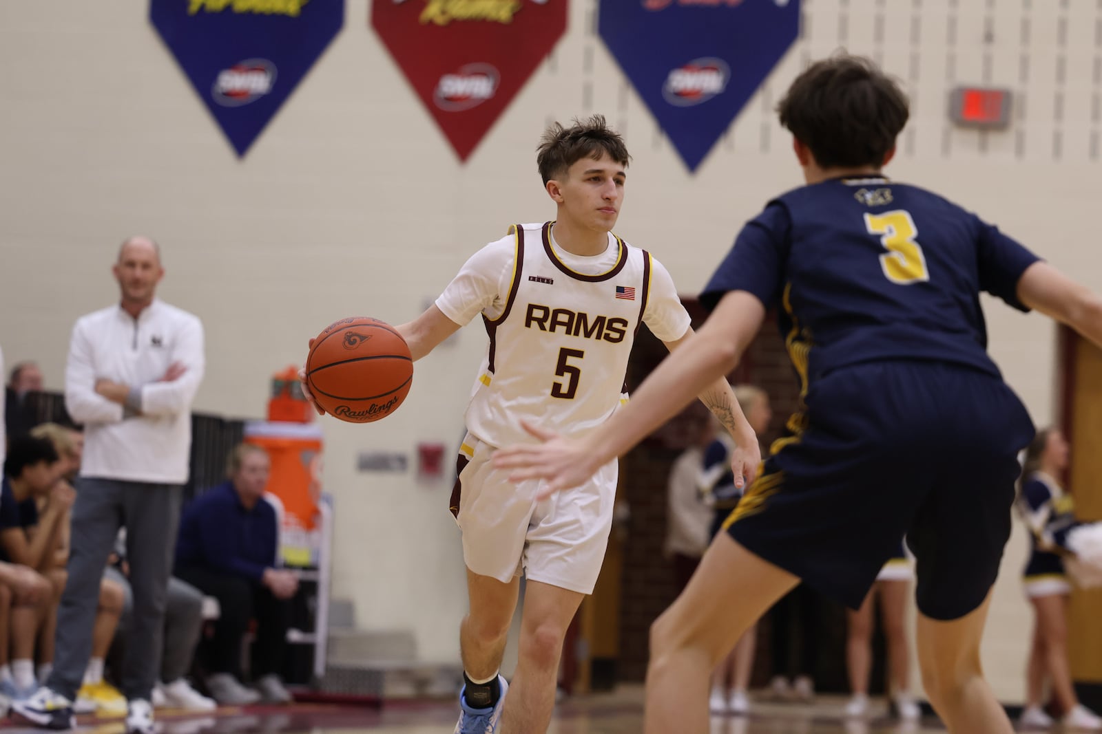 Ross senior guard Caden Stidham (5) dribbles the ball up the court during his game against Monroe on Friday night at Ross High School. ELIJAH COOK / CONTRIBUTED