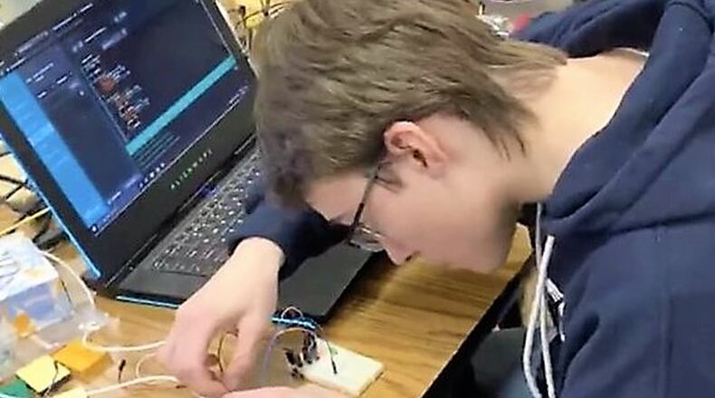 Students from a Fairfield High School science class has for the second consecutive year won $50,000 in science equipment for their Butler County school after earning a finalist ranking in a national science contest. Pictured is Dylan Luttrell, class of 2020, working on the class project. (Provided Photo/Journal-News)