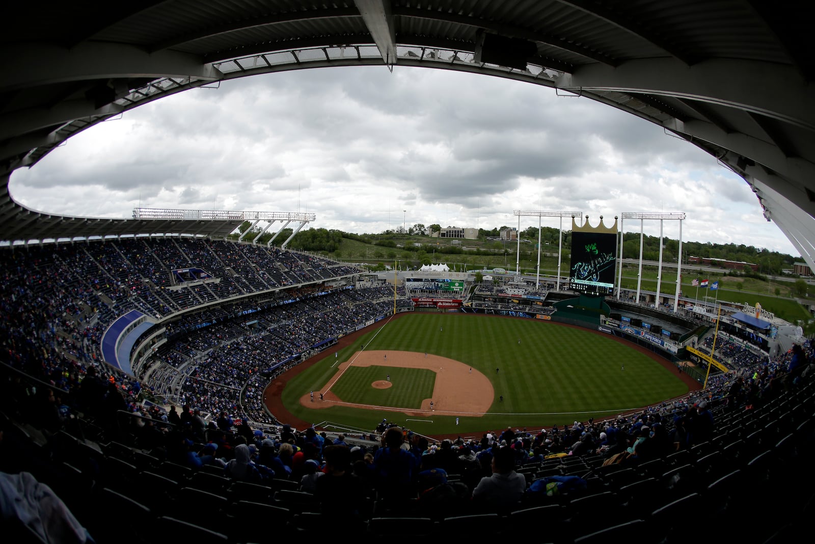 FILE - Fans watch during a baseball game between the Kansas City Royals and the Minnesota Twins Sunday, April 30, 2017, in Kansas City, Mo. (AP Photo/Charlie Riedel, File)