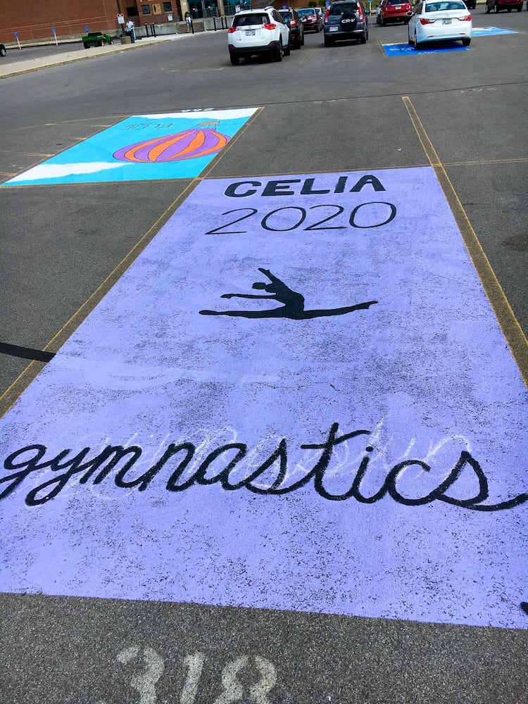 PHOTOS Lakota East seniors paint parking spots