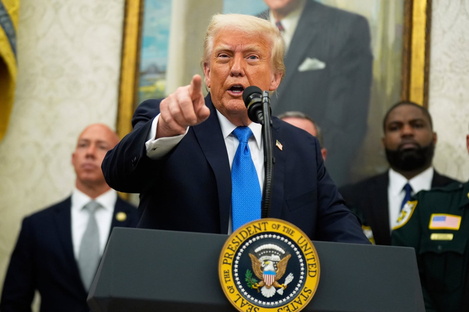 President Donald Trump speaks during an event to present law enforcement officers with an award in the Oval Office at the White House, Monday, May 19, 2025. (AP Photo/Manuel Balce Ceneta)