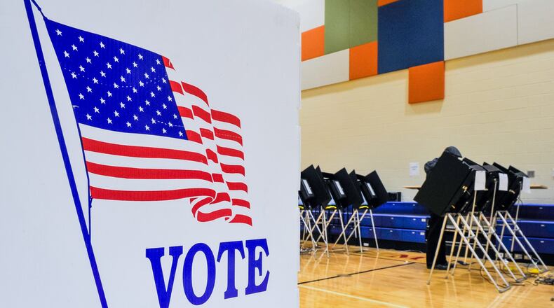 The Ohio Secretary of State has directed the 88 county boards of elections on the precautions needed to take to prevent the spread of flu and viruses, including the coronavirus. Voting equipment will be regularly wiped with disinfecting cloths and hand sanitizer bottles will be available during in-office early voting and Election Day voting. Voters can also request absentee ballots to be mailed to their home. NICK GRAHAM/FILE