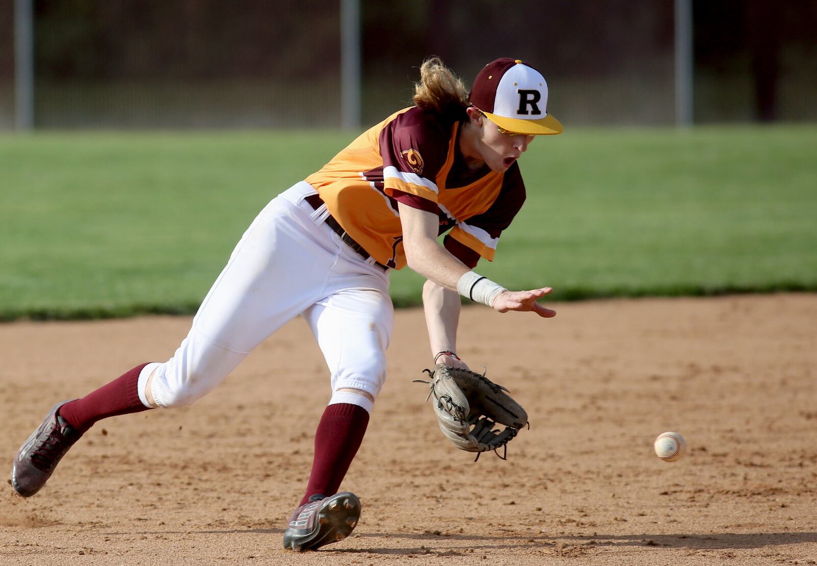Ross shortstop Tyler Flick fields an Edgewood ground ball during Wednesday’s game in Ross Township. CONTRIBUTED PHOTO BY E.L. HUBBARD
