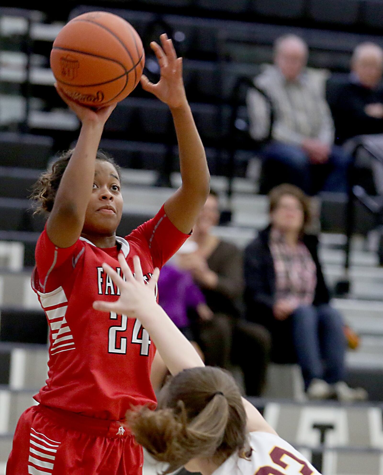 Fairfield guard Brooke Spaulding shoots over Turpin guard Savanna Hazenfield during their Division I sectional semifinal Thursday night at Lakota East. CONTRIBUTED PHOTO BY E.L. HUBBARD
