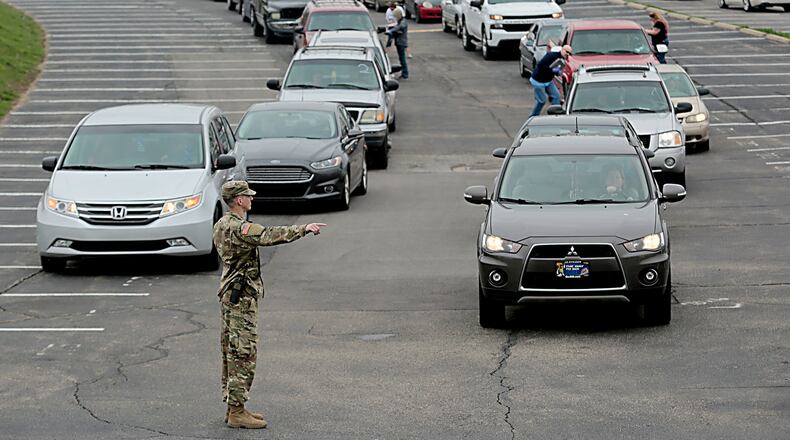 Shared Harvest Foodbank distributed emergency food boxes to 1,335 families on Saturday, April 3, 2020, at Fairfield High School. Officials prepared to distribute food to 2,000 families, but believed the long lines discouraged some who likely left due to the long wait. Officials say they extended the distribution event due to the response. Around 60 Ohio National Guard and Army Reserve members assisted Saturday with 20 foodbank staff and volunteers. PROVIDED (E.L. HUBBARD/SHARED HARVEST FOODBANK)