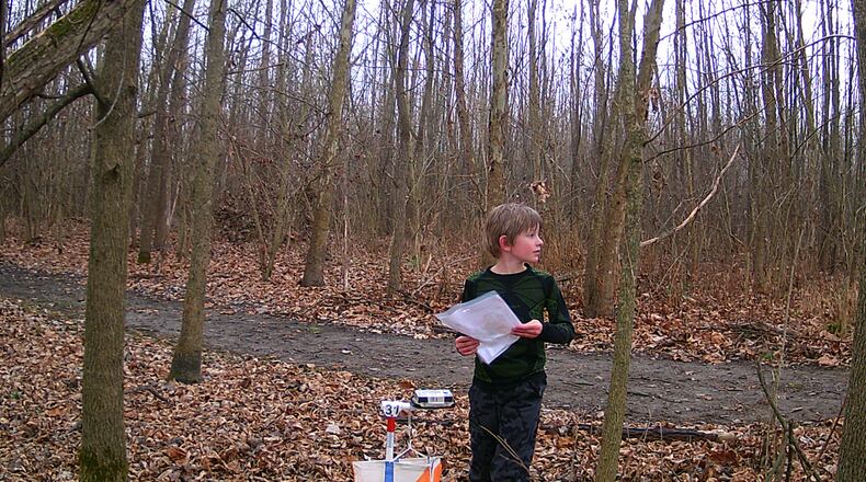 A boy named Isaac is seen participating in orienteering, an event planned for Dec. 31 and Jan. 1, 2024 at Governor Bebb MetroPark in Okeana. CONTRIBUTED