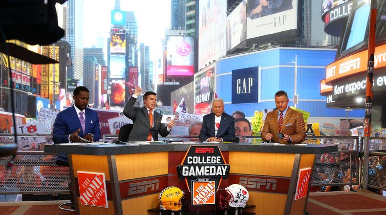 NEW YORK, NY - SEPTEMBER 23: Lee Corso, Kirk Herbstreit, Chris Fowler are seen during ESPN's College GameDay show at Times Square on September 23, 2017 in New York City. (Photo by Mike Stobe/Getty Images)